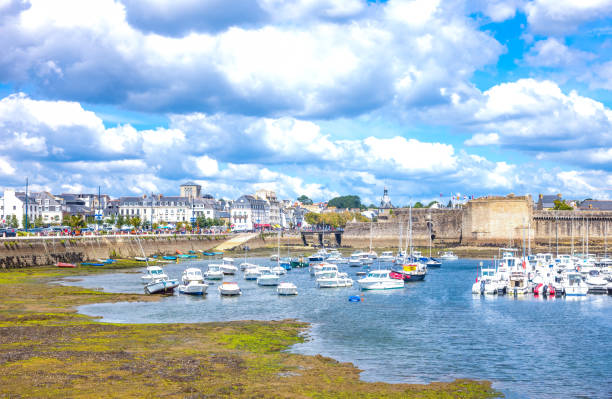 Concarneau, France - August 10, 2017: View of the De La Plaisance harbor with the ramparts of Ville Close in the background