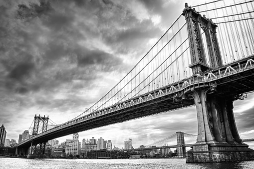 View of two bridges on the East River - black and white HDR image.