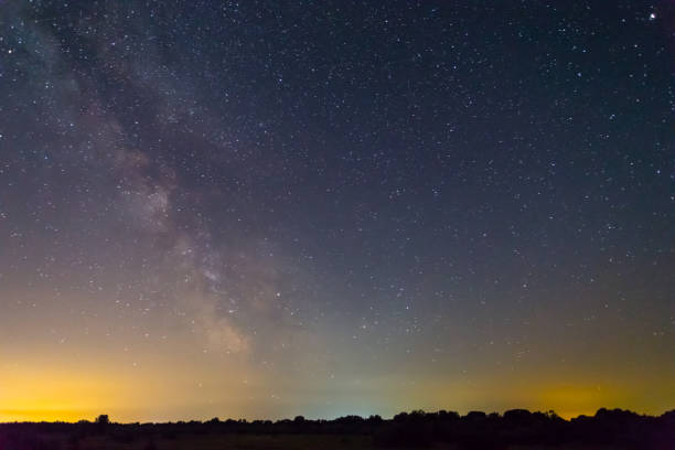 istock night dark sky with milky way 900803726