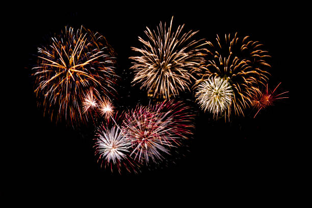 beautiful fireworks display on black background isolated fireworks on black background firework man made object stock pictures, royalty-free photos & images