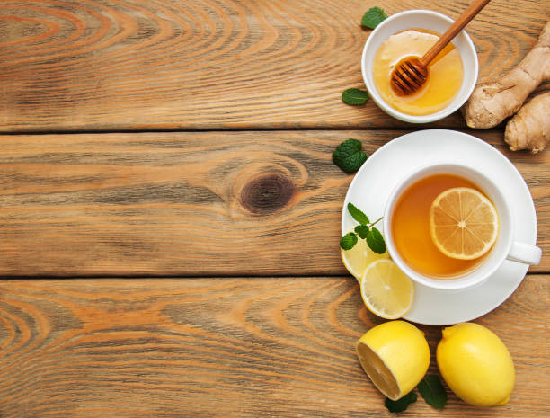 istock Cup of tea with lemon and ginger 900811392