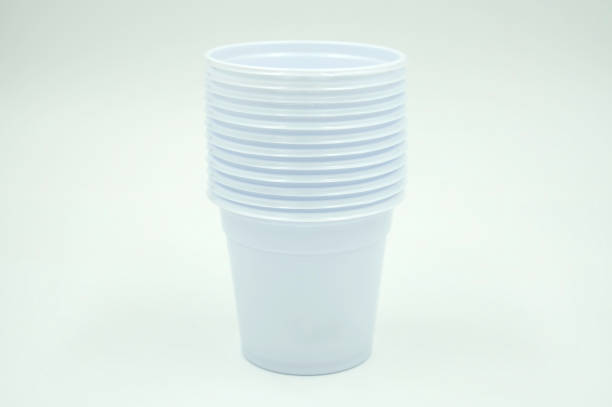 istock empty white plastic cup isolated on white background of file with Clipping Path 900811530