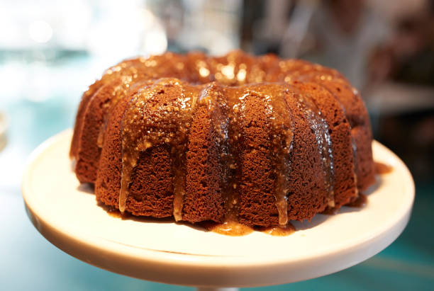 istock Freshly Baked Treacle Cake On Stand In Coffee Shop 900812780