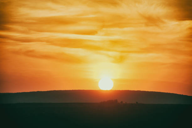 istock Beautiful dramatic sunset - soft selected focus and vintage effect 900813588