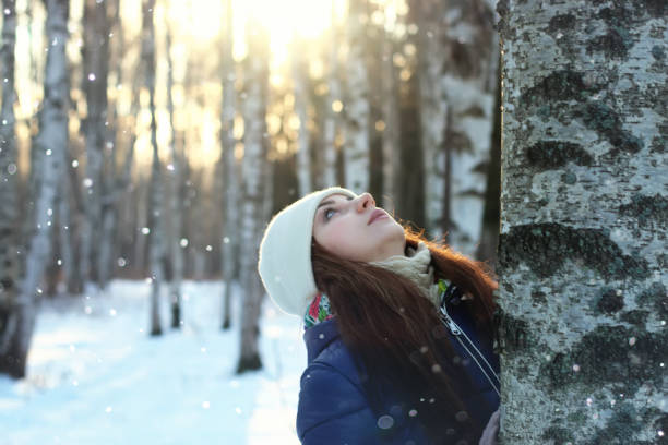 snow winter portrait female outdoor in a park