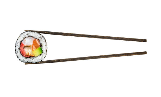 Sushi roll with salmon, shrimps and avocado Sushi roll with salmon, shrimps and avocado isolated on white background chopsticks photos stock pictures, royalty-free photos & images
