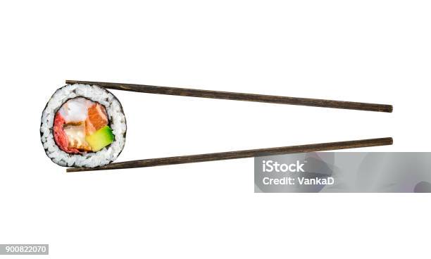 Sushi Roll With Salmon Shrimps And Avocado Stock Photo - Download Image Now - Sushi, Chopsticks, Cut Out