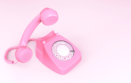 Pink rotary phone isolated on pink background. 3D illustration