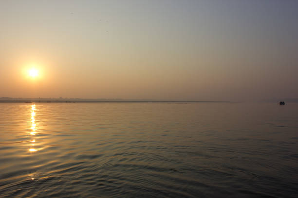 istock Sunrise in the Ganges in Varanasi, India 900832026