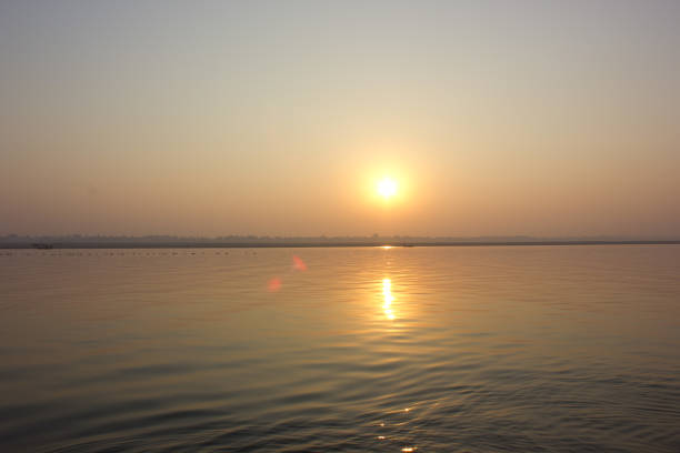 istock Sunrise in the Ganges in Varanasi, India 900832030