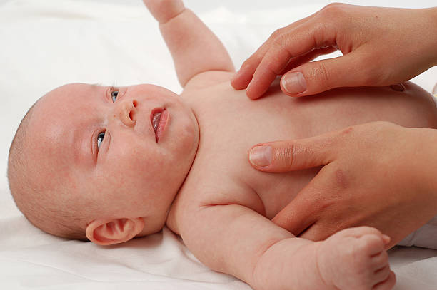 istock newborn child massage 90083395
