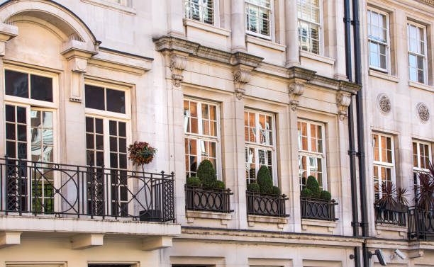 Residential aria of Mayfair with row of periodic buildings. Luxury property in the centre of London. London, UK - September 8, 2016: Residential aria of Mayfair with row of periodic buildings. Luxury property in the centre of London. Mayfair stock pictures, royalty-free photos & images