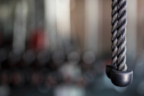 Rope Gym equipment in gym Gym with Blurred background Rope Gym equipment in gym Gym with Blurred background bicep photos stock pictures, royalty-free photos & images