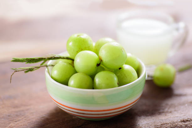 istock Indian gooseberry fruit and juice 900841502