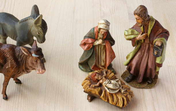 istock Christmas crib scenery with ox and donkey 900848214