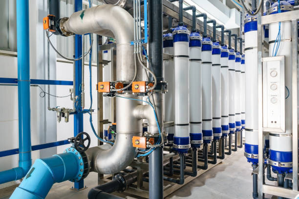 istock Modern water filtrating and purification system for industrial factory 900848904