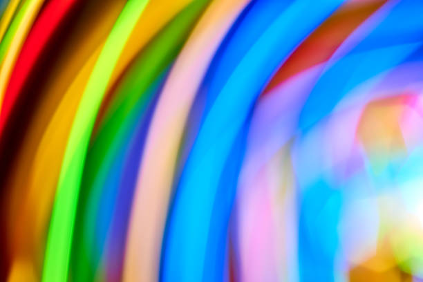 istock Bokeh abstract light background and texture,Blurred of colorful bokeh abstract on unfocused background,Color Line of light, long exposure motion lights 900849010