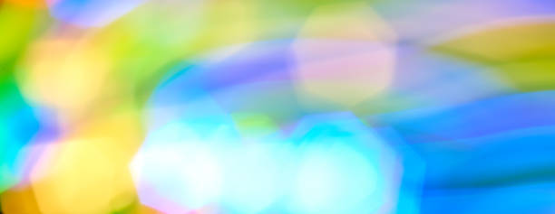 istock Bokeh abstract light background and texture,Blurred of colorful bokeh abstract on unfocused background,Color Line of light, long exposure motion lights 900849240