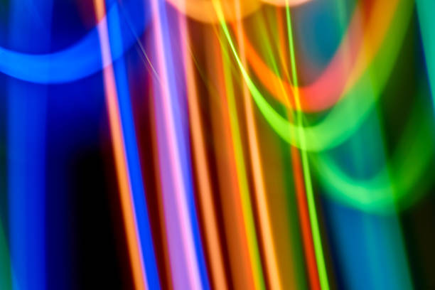 istock Bokeh abstract light background and texture,Blurred of colorful bokeh abstract on unfocused background,Color Line of light, long exposure motion lights 900849638