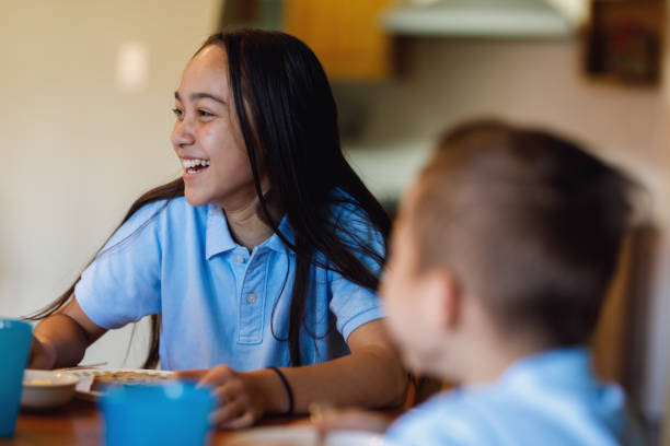 istock School Girl Having Breakfast 900856772