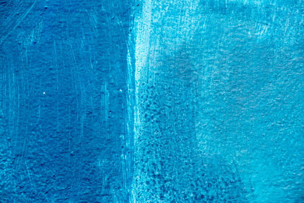 istock Abstract blue color painting on concrete block background 900860106