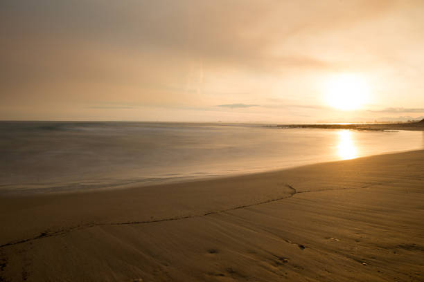 sunset over the sea in the Cava Randello Integral Nature Reserve, Scoglitti, Sicily, Italy