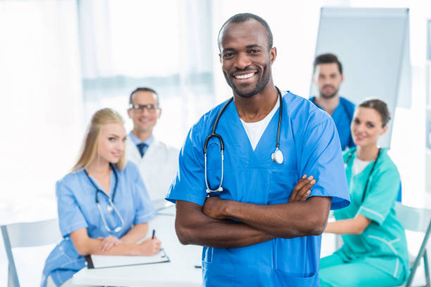 istock doctor with crossed arms 900861236