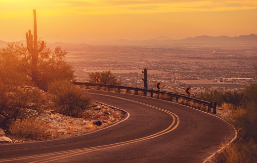 Scenic Winding Arizona Mountain Road with City of Phoenix Vista. United States of America.