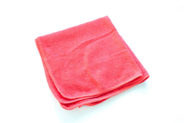 istock Close up new red wipes or rags isolated on white background. (Selective focus) 900872990