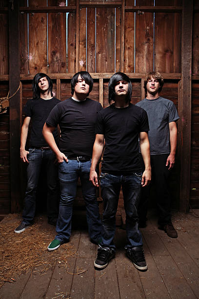istock Standing Dark Shirted Males in Barn 90087642