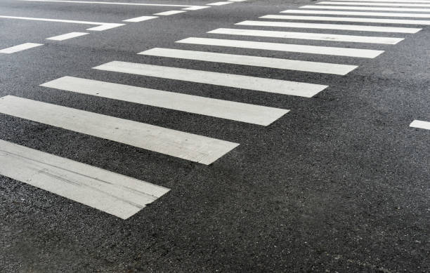istock pedestrian pathway on a street crossing 900882594