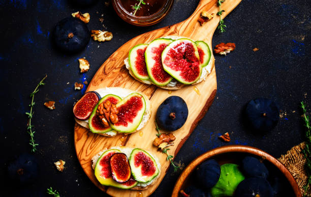 istock Healthy breakfast, crostini with cheese, fig and honey 900883964