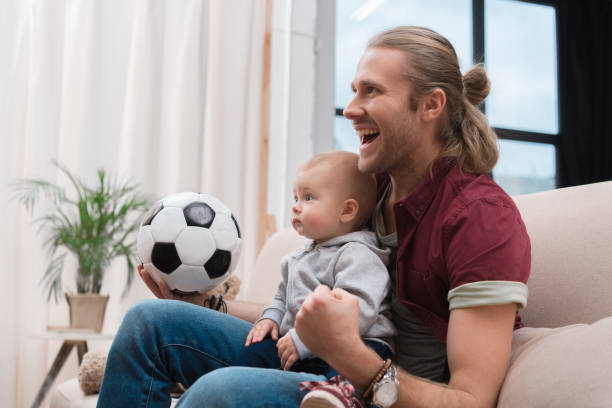 istock excited father with baby boy 900887126