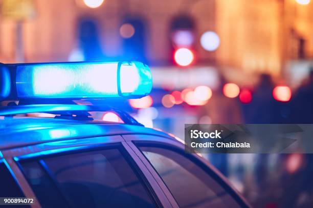 Police Car On The Street Stock Photo - Download Image Now - Police Force, Emergency Siren, Police Vehicle Lighting