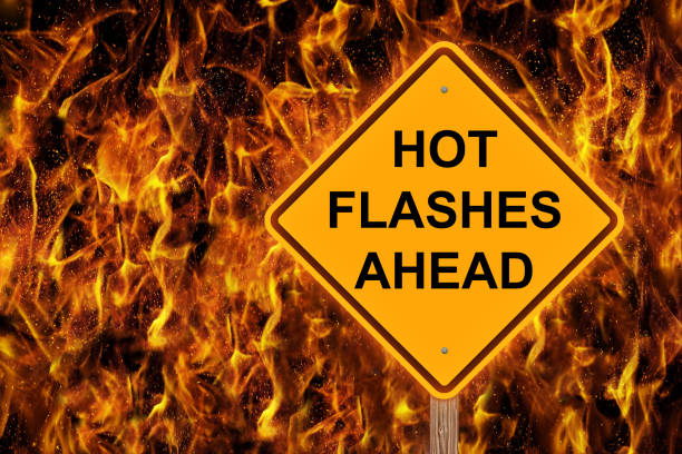 istock Hot Flashes Ahead Warning With Flaming Background 900894144