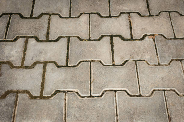 istock Cement walkway closeup detail 900894156