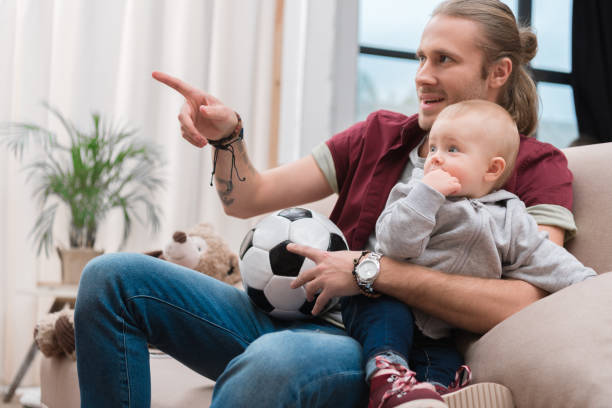 istock happy father with baby boy 900897580