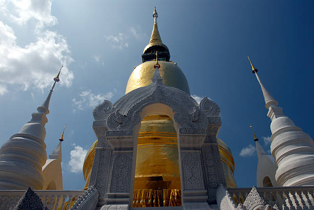 Goldern temple dome under midday sun stock photo