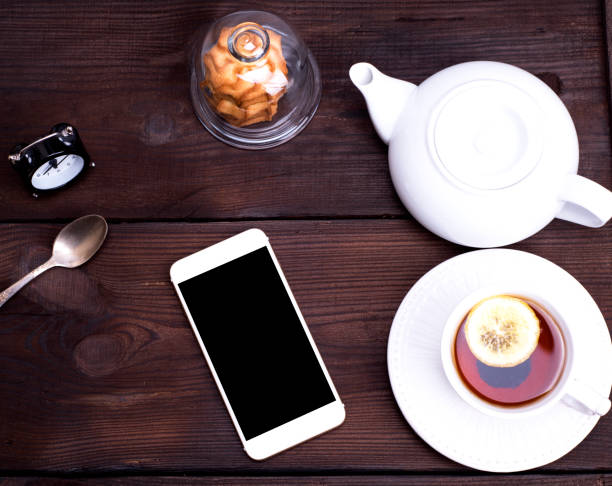 istock black tea with lemon in a round white ceramic cup 900905162
