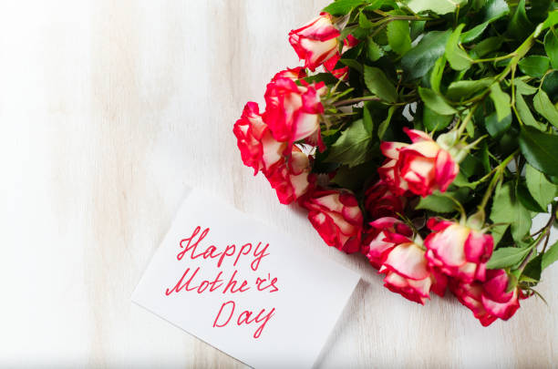 istock Happy Mother's Day Concept-- Post card with roses. 900909080