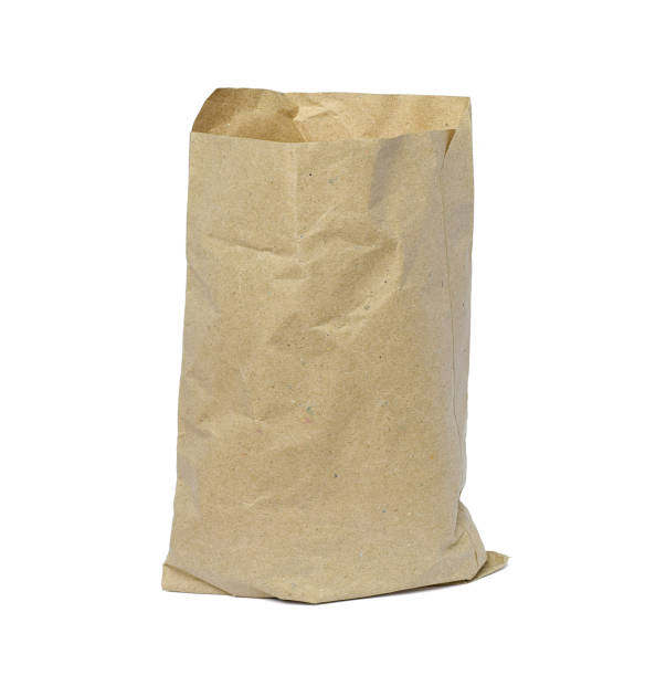 istock Empty brown paper bag isolated on white background 900909104