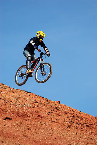 Fly mountain biker stock photo