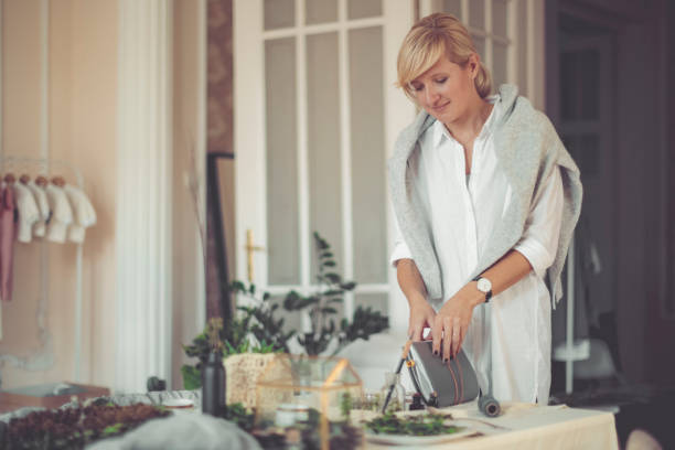 istock Young businesswoman is holding a personal organizer 900913012
