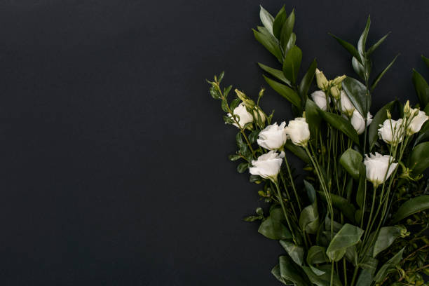 istock top view of bouquet with eustoma flowers over black background 900913068