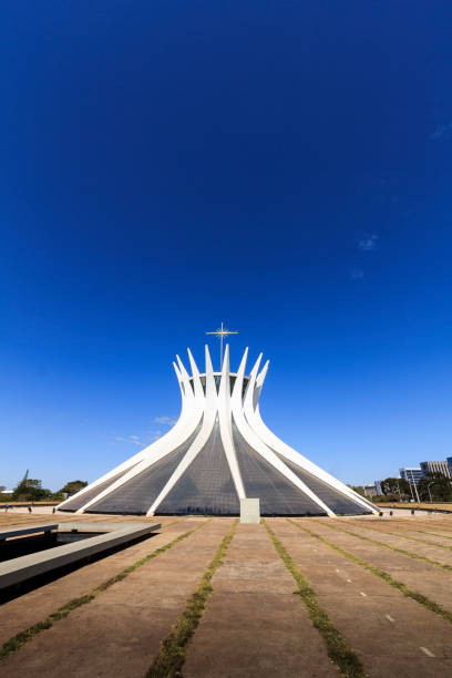 Brasilia, Distrito Federal, Brazil - july 22, 2017: A DSLR Canon photo of Brasilia Cathedral by architect Oscar Niemeyer in a bright cloudless day.