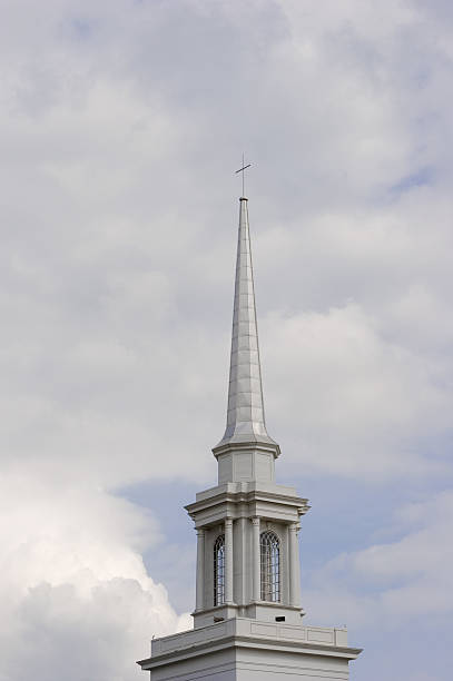 istock Church steeple against clouded sky. 90091456