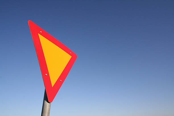 Yield sign stock photo