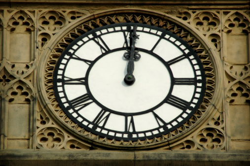 Clocktower clock at 12:01.