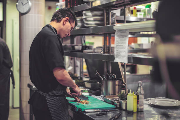 istock Chef is working in an italian restaurant 900918286