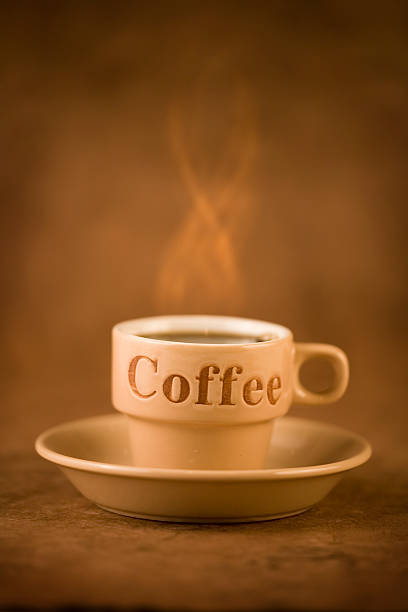 cup of steaming coffee stock photo